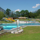 Frau_auf_Stein_JPG-1274792109