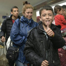 Flüchtlinge erreichen mit Bussen Wiener Westbahnhof