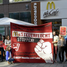 SJ-Demo vor McDonald\'s-Filiale auf Mariahilfer Straße