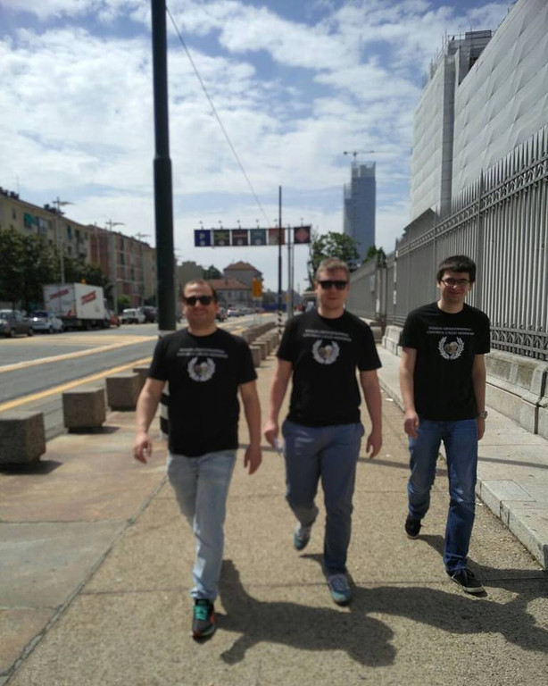 3 men walking.jpg