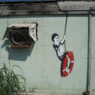 800px-Banksy_Swinger_Building_Detail.jpg