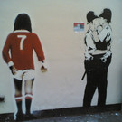 Banksy_Kissing_Policemen.jpg