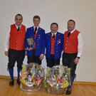 Kapellmeister Reinhard Fetz_ 25 Jahre Martin Fink_ 40 Jahre Gerhard Gasser_ Obmann Mathias Simma.jpg
