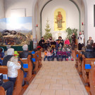 Singen vor der Krippe in der Franziskanerkirche 2019