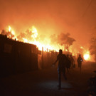 APTOPIX_Greece_Migrant_Camp_Blaze_60985.jpg