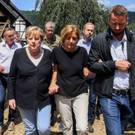 2021-07-18T141654Z_682333429_RC22NO9JOW9Z_RTRMADP_3_EUROPE-WEATHER-GERMANY-MERKEL.jpg