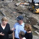 2021-07-18T142429Z_1164080832_RC22NO9IZSZ4_RTRMADP_3_EUROPE-WEATHER-GERMANY-MERKEL.jpg