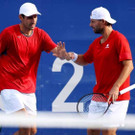 2021-07-26T084014Z_1198544162_SP1EH7Q0MHY57_RTRMADP_3_OLYMPICS-2020-TEN-M-DOUBLES-8FNL-000600.jpg