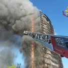 2021-08-30T060324Z_687520941_RC2HFP985P3H_RTRMADP_3_ITALY-FIRE-MILAN.jpg