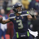 Seahawks_Broncos_Wilson_Trade_Football_87077.jpg