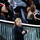 2022-03-28T032545Z_1002773739_HP1EI3S09IV9I_RTRMADP_3_AWARDS-OSCARS.JPG