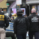 2022-04-12T135303Z_627880967_RC2PLT9WMZJJ_RTRMADP_3_NEW-YORK-SHOOTING.JPG