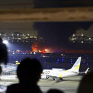 Japan_Plane_Fire_90463.jpg