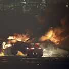 Japan_Plane_Fire_62611.jpg