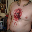 gruesome tattoo of hole in chest.jpg
