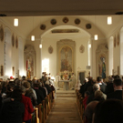 Festgottesdienst vor vollem Haus.JPG