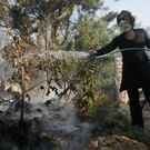 Großbrand in Israel - Helfer schöpfen Hoffnung