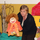 Spielkiste-Kinder beim Puppenspiel "Karlinchen" in der Bibliothek Schlins 