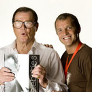 Sir Roger Moore and Manfred Baumanns Book.jpg