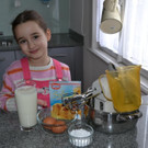 Nina kocht Schneebällchen mit Vanillesoße