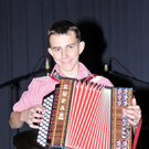 Marcel mit seiner Steirischen.jpg