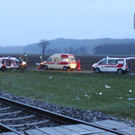 Zusammenstoß Rotes-Kreuz-Auto mit einem Zug