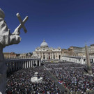 2014-04-20T092620Z_1912314891_GM1EA4K1CDU01_RTRMADP_3_POPE.JPG